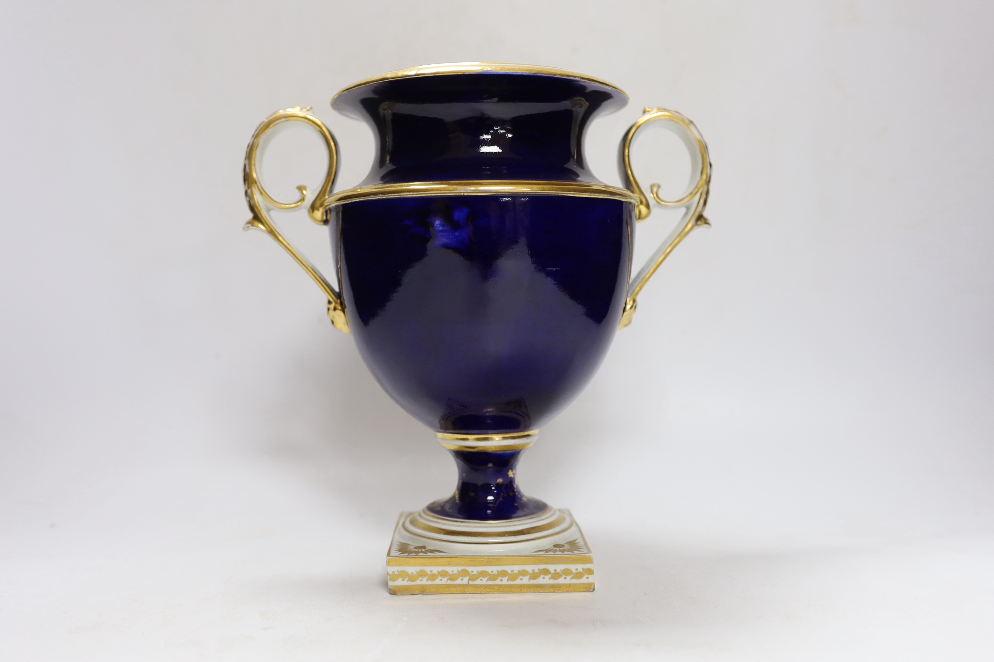 A garniture of three early 19th century Derby vases painted with fruit, tallest 23cm